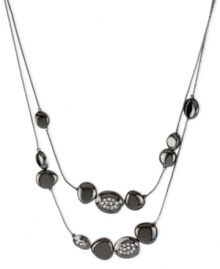 Beautiful beads make a bold statement on this illusion necklace from Robert Lee Morris. Crafted from hematite-tone mixed metal, the necklace sparkles with lustrous glass pave crystal accents. Approximate length: 16 inches + 3-inch extender. Approximate drop: 2 inches.