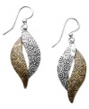 Funky and fashionable. Jody Coyote's two tone earrings feature swirling, textured drops in sterling silver and bronze on french wire. Approximate drop: 1-3/4 inches.