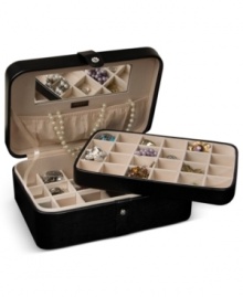 Beautiful inside and out, the Remy jewelry box houses innumerable trinkets between a lift-out drawer, divided sections and in-lid catch. A rich faux leather exterior and sparkling crystal snap add elegance to the practical storage solution by Mele & Co. Beautiful inside and out, the Remy jewelry box houses innumerable trinkets between a lift-out drawer, divided sections and in-lid catch. A rich faux leather exterior and sparkling crystal snap add elegance to the practical storage solution by Mele & Co.
