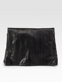 Sumptuously smooth leather finished with vertical stitching in a sleek foldover bag.Magnetic flap closureOne inside zip pocketCotton lining13¼W X 10H X 1¼DMade in Italy Sumptuously smooth leather finished with vertical stitching in a sleek foldover bag.Magnetic flap closureOne inside zip pocketCotton lining13¼W X 10H X 1¼DMade in Italy
