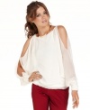 This ethereal top from Jessica Simpson will have you channeling your inner goddess! Shoulder-revealing cutouts and draped chiffon fabric add softness to the look.