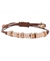 Breezy and bohemian. Fossil's free-spirited style combines river shells in pretty peach hues, sparkling crystal beads, a natural leather cord, and rose gold tone mixed metal accents. Approximate diameter: 2-1/2 inches.