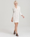 Play up the season's signature shade in this wear-everywhere Rachel Zoe white crochet dress. Sun-kissed skin will get its fair share of attention with three quarter sleeves and abbreviated hem. Couple with strappy sandals and your favorite tote for a whimsical, warm weather look.