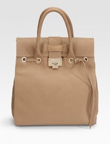 An exquisitely shaped satchel with grainy calf leather construction, features a slim buckle strap looped around goldtone grommets and a glowing logo plaque.Double top handles, 5 drop Flip-lock flap closure One inside zip pocket Protective metal feet One inside zip pocket Two inside open pockets Suede lining 14W X 17H X 5D Made in Italy