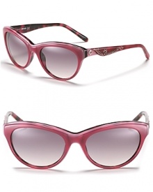 Western-inspired cat eye sunglasses with contrast leopard interior and studded sides.