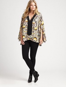 Beyond glamorous, an airy top featuring an embroidered neckline, kimono sleeves and a lively print. Pair this relaxed-fit design with slim pants or skinny jeans.Embellished necklineDolman sleevesAllover printPull-on styleAbout 29 from shoulder to hemViscoseDry cleanMade in USA