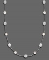 Dress up your day wear or sparkle in the evening: this gorgeous fireball necklace by Monet features glass pearls & pave crystal accents set in shining silvertone mixed metal. Approximate length: 16-18 inches.