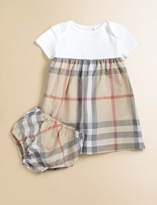 Charming checks add a splash of color to this A-line frock in plush cotton with matching bloomers.Envelope necklineShort sleevesPullover styleGathered waistCottonMachine washImported Charming checks add a splash of color to this A-line frock in plush cotton with matching bloomers.Envelope necklineShort sleevesPullover styleGathered waistCottonMachine washImported