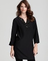 Delicate hand beading lends luxury with a hint of glamour to your every day in this Lafayette 148 New York tunic.