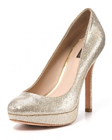 Gleaming in glitter, these Joan & David pumps add dazzling radiance to the evening's events. Gleaming in glitter, these Joan & David pumps add dazzling radiance to the evening's events.