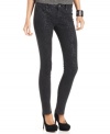 Reinvent your look with these on-trend skinny jeans, featuring a subtle, tonal animal print. From DKNY Jeans.