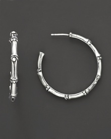 From the Bamboo collection, medium hoop earrings inspired from bamboo, designed by John Hardy. From the Bamboo collection, medium hoop earrings inspired from bamboo, designed by John Hardy.