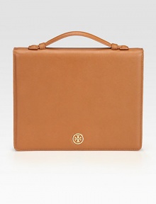 Luxurious saffiano leather surrounds your iPad® for a stylish cover.Side handle, 1½ dropSaffiano leatherSnap button closureSuede lining7½W X 9½H X 1DImportedPlease note: iPad® not included. Luxurious saffiano leather surrounds your iPad® for a stylish cover.Side handle, 1½ dropSaffiano leatherSnap button closureSuede lining7½W X 9½H X 1DImportedPlease note: iPad® not included.