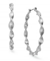 Say hello to these modern hoops from Alfani. With a wavy silhouette, they add pop to your already chic look. Crafted in imitation rhodium tone mixed metal. Approximate diameter: 2-5/8 inches.