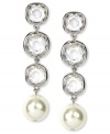 Crystal accents and white glass pearls shine bright on these Givenchy linear drop earrings. Crafted in imitation rhodium plated mixed metal. Approximate drop: 2-1/3 inches.