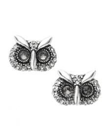 Stud earrings are a fashion staple, but Fossil offers a fun twist on a traditional look with this whimsical owl motif. Set in silver tone mixed metal, they're adorned with eye-catching crystal embellishments. Approximate diameter: 3/8 inch.
