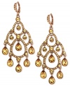 Ornate elegance. Givenchy's chandelier earrings, crafted from brown gold-tone mixed metal, feature light Colorado topaz accents for a visually appealing effect. Approximate drop: 6 inches.