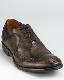 John Varvatos rocks the classic wingtip in style, rendering it in burnished calfskin and soft leather linings. John Varvatos rocks the classic wingtip in style, rendering it in burnished calfskin and soft leather linings.