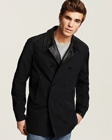 Cool city style from John Varvatos, the double breasted trench has tonal leather trim and light lining for an easy everyday layer. Cool city style from John Varvatos, the double breasted trench has tonal leather trim and light lining for an easy everyday layer.