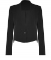 Modernized with a rounded asymmetrical hemline, this collarless jacket from Theyskens Theory puts a dramatic spin on workweek chic - Collarless, long sleeves, single button closure, on-seam side pockets, padded shoulders - Sharply tailored fit - Wear with tees and jeans, or over sleek sheath dresses