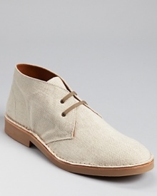 A lean chuckka from Hunter, crafted in cream linen, with a contrast rubber sole. A lean chuckka from Hunter, crafted in cream linen, with a contrast rubber sole.