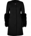 Ultra-elegant coat in high-quality wool and cashmere blend - Features fox fur sleeves for an added element of luxury - Slim, tailored silhouette is slightly flared - Features round neck, hidden button placket, side pockets and back half-belt - Pair with cocktail dresses at your next special event