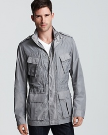 Michael Kors protects you from the elements and provides a distinct look with this sleek, military-inspired jacket, replete with front pocket details that blend utility with modern appeal. Michael Kors protects you from the elements and provides a distinct look with this sleek, military-inspired jacket, replete with front pocket details that blend utility with modern appeal.