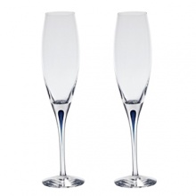 Orrefors Intermezzo Blue Collection designed by Erika Lagerbielke. From the name synonymous with unique and luxurious art glass, Orrefors' Intermezzo Blue has a distinct teardrop of blue in the stem. Orrefors Intermezzo Blue Collection designed by Erika Lagerbielke. From the name synonymous with unique and luxurious art glass, Orrefors' Intermezzo Blue has a distinct teardrop of blue in the stem.