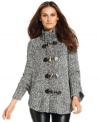 Cozy up to this plush cardigan from MICHAEL Michael Kors, featuring striking toggle closures and cape styling!