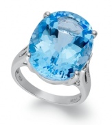 Richly colored with plenty of sparkle, this fun, bright ring features a dramatic oval-cut blue topaz (21-9/10 ct. t.w.) set in sterling silver. Size 7.