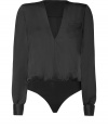 Stylish bodysuit made ​.​.from a fine silk-cotton blend - In classic black - The top is cut like an elegant blouse - Fashionably asymmetrical, collarless - Long sleeves with elegant cuffs - Tremendously pleasant and comfortable to wear, nothing slips, nothing pulls - Wear with a pencil skirt, tuxedo pants, a leather mini skirt