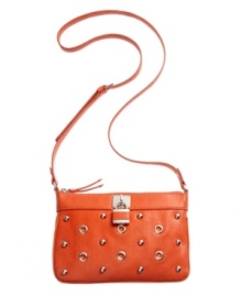 Absolutely delicious. This eye-catching crossbody from Nine West in an assortment of scrumptious colors is the perfect complement to your summer wardrobe. Polished silver-tone ball and circle design adorn the front with a sweet signature lock, for an altogether carefree style you'll love. Absolutely delicious. This eye-catching crossbody from Nine West in an assortment of scrumptious colors is the perfect complement to your summer wardrobe. Polished silver-tone ball and circle design adorn the front with a sweet signature lock, for an altogether carefree style you'll love.