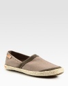 A summertime favorite with a natural feel finished in cotton canvas.Leather upperPadded insoleRubber soleImported