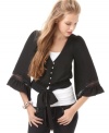 Tie up a super-cute look with XOXO's angel sleeve top, showcasing a lace-up back.
