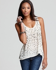 A sprinkling of rhinestones, beads and sequins create a confectionary delight on this silk Joie top--a holiday (and every day) must-have for this season of gorgeous glamour. A sprinkling of rhinestones, beads and sequins create a confectionary delight on this silk Joie top--a holiday (and every day) must-have for this season of gorgeous glamour.