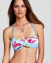 Hit print with this bold, floral swimsuit from Tommy Bahama. A bandeau neckline and padded cups ensure this piece is as flattering as it is stylish.