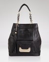 DIANE von FURSTENBERG's oversized leather tote is designed to defy the seasons. Whether work or weekend, this versatile bag exudes cool paired with slick skinnies and ankle boots.