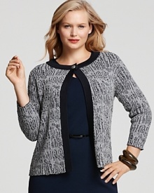 Infuse your look with uptown polish in this Jones New York Collection cardigan, crafted in a textured bouclé knit with solid ribbed trim. Complete the refined look with a chic pencil skirt and a string of pearls. Infuse your look with uptown polish in this Jones New York Collection cardigan, crafted in a textured bouclé knit with solid ribbed trim. Complete the refined look with a chic pencil skirt and a string of pearls.