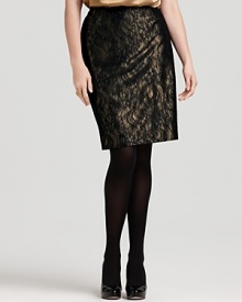 Rich black lace ensconces a glamorous golden Jones New York collection pencil skirt, creating a captivatingly feminine evening look. Rich black lace ensconces a glamorous golden Jones New York collection pencil skirt, creating a captivatingly feminine evening look.