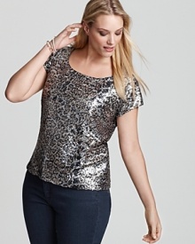 An all-over leopard sequin pattern infuses this Jones New York Collection top with high-impact shine, creating a spot-on look for your next social affair. An all-over leopard sequin pattern infuses this Jones New York Collection top with high-impact shine, creating a spot-on look for your next social affair.