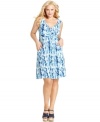 Tie up a darling casual look with Style&co.'s sleeveless plus size dress, finished by a knotted front.