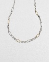A bold and smart combination of cabled and smooth, large and small oval links in sterling silver and 18k yellow gold. 18k yellow gold and sterling silver Length, about 32 Lobster clasp Made in USA