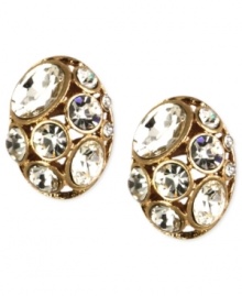 A tiny treasure from Jones New York. These button earrings add big sparkle with clear stones on a golden base. Crafted in worn gold tone mixed metal. Approximate diameter: 1/2 inch.