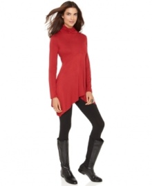 Joseph A's elegantly-draped tunic gets a makeover with an intriguing asymmetrical hem. Joseph A's elegantly-draped tunic gets a makeover with an intriguing asymmetrical hem.