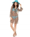Get a fierce look for your exotic trip! This sheer leopard print Cejon tunic-style cover-up is ideal for beach bunny chic.