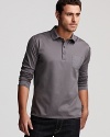 Layer this sleek long sleeve polo under a blazer or match with your best jeans for a undeniably cool downtown look.
