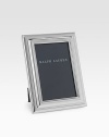 Like details seen in classic architecture, this shimmering silver-plated design flaunts your treasured photos fabulously. Black fabric backing Anti-tarnish finish Silver-plated RL closure Signature gift box Imported