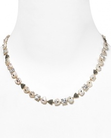 Judith Jack's pearl collar necklace with cubic zirconia stations sparkles with timeless charm. Wear this stunning, vintage-inspired adornment for an instant wow factor. Judith Jack's pearl collar necklace with cubic zirconia stations sparkles with timeless charm. Wear this stunning, vintage-inspired adornment for an instant wow factor.