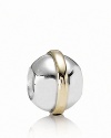 This shiny sterling silver orb features 14K gold detailing for a versatile, two-tone look. Charm by PANDORA.