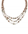 Add stylish dimension to any ensemble with three, chic layers. 2028 necklace features silver, rose gold tone mixed metal chains and filigree beads mixed with sparkling clear crystals. Approximate length: 16 inches + 3-inch extender.